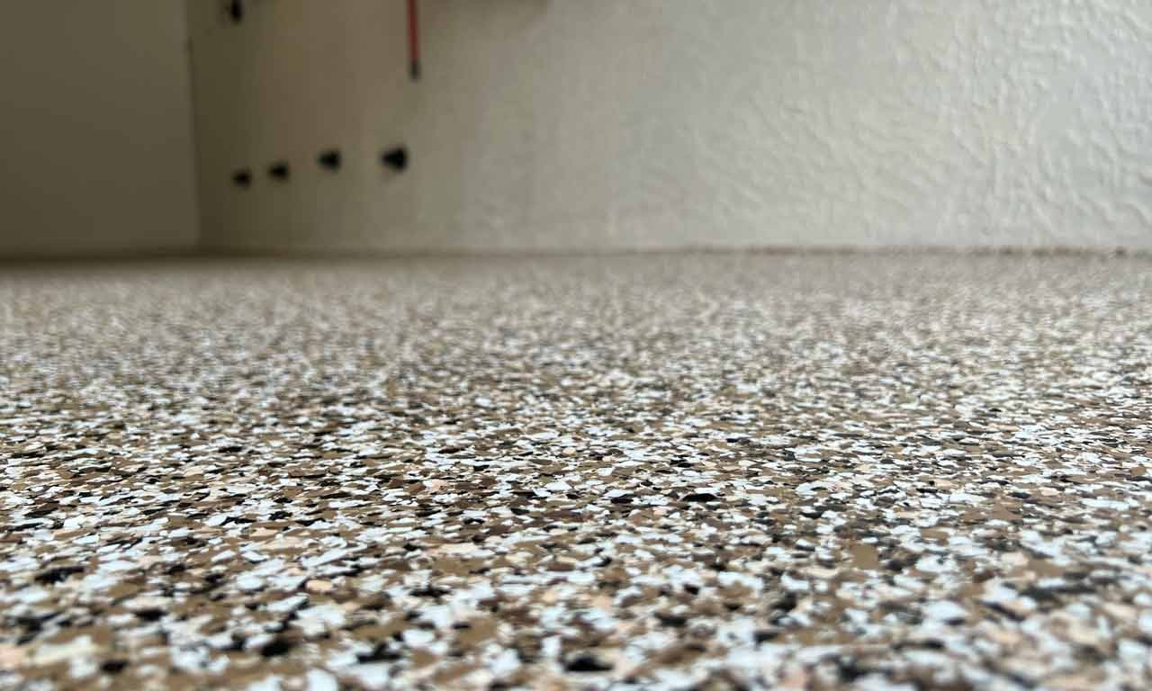 Close-up of a finished flake epoxy garage floor